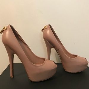 Louis Vuitton peep toe pumps. Dusty rose leather